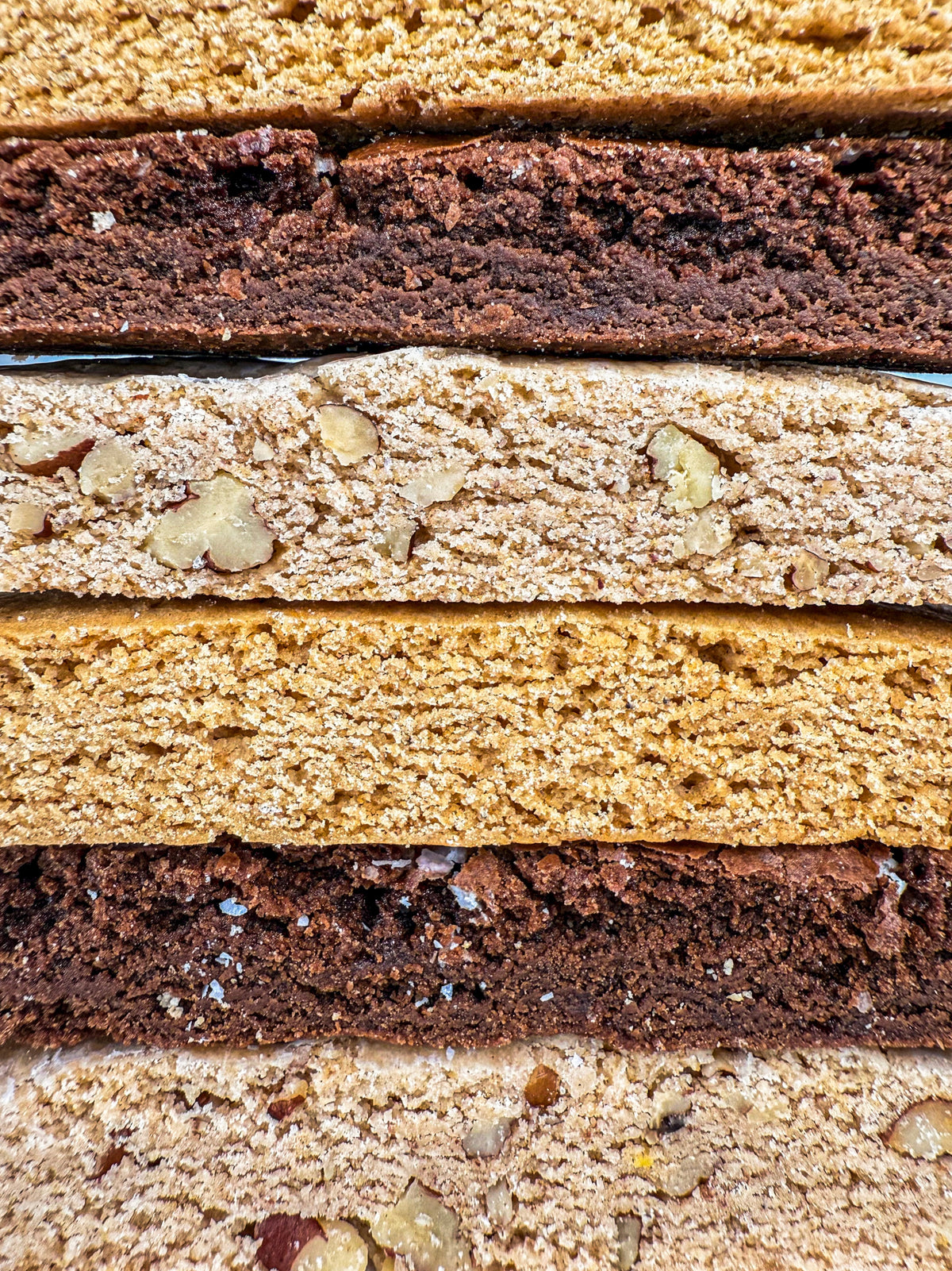 a close-up image of a stack of biscotti
